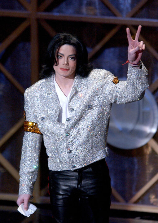 399369 133: Singer Michael Jackson accepts his Peformer of the Century Award during the 29th Annual American Music Awards at the Shrine Auditorium January 9, 2002 in Los Angeles, CA