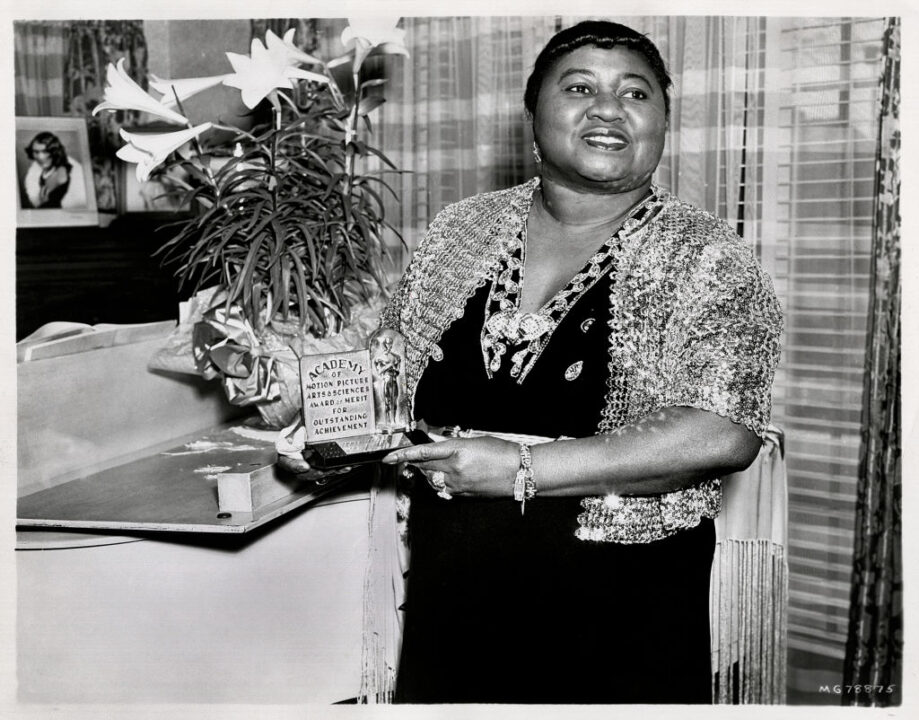 Portrait of American actress Hattie McDaniel (1892 - 1952) holding her Academy Award from the film 'Gone With the Wind,' Hollywood, California, 1940