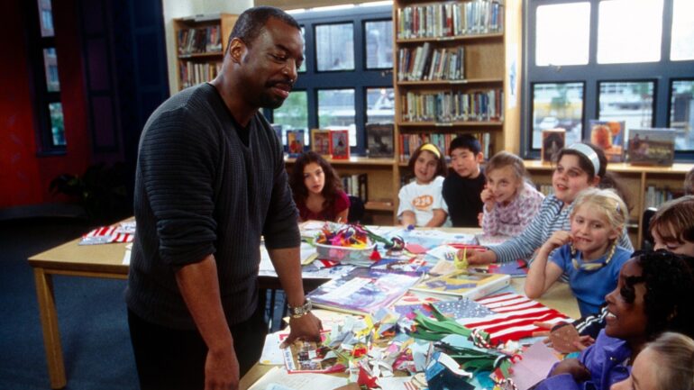 Reading Rainbow LeVar Burton (left) talks to students at P.S. 234 in Manhattan, an elementary school just blocks away from the World Trade Center, to ask how they've coped during the past year, (Season 14, ep. 1407, aired September 2, 2002), 1983-2006