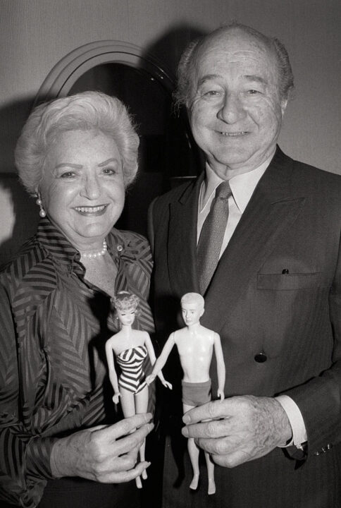 A portrait of Ruth and Elliott Handler, the couple who introduced the Barbie doll in 1959, holding a Barbie and Ken doll. The couple will receive the Lifetime Achievement Award from Doll Reader magazine.
