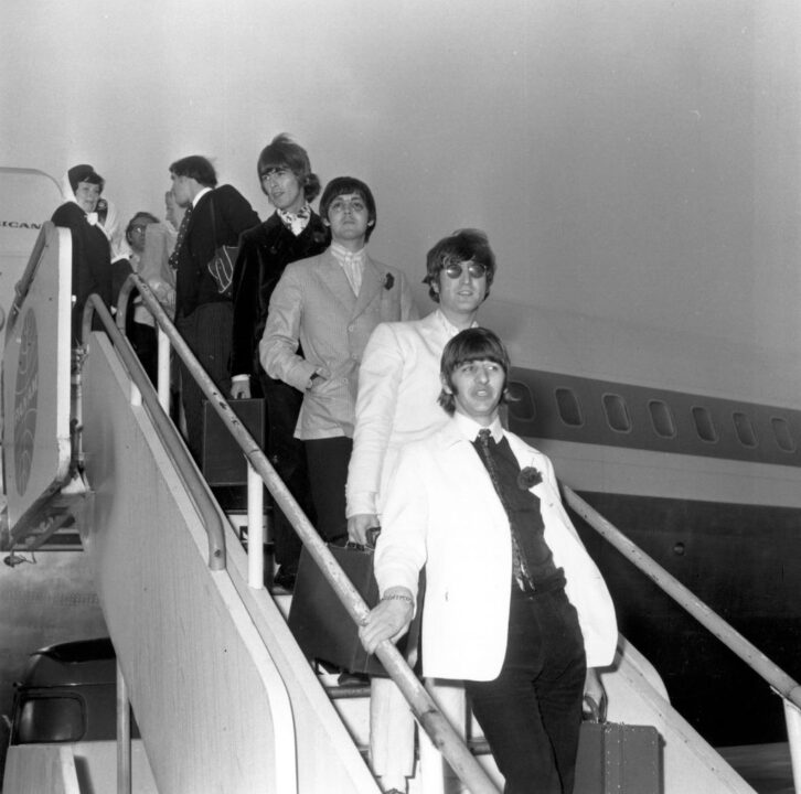 31st August 1966: The Beatles disembark from an aeroplane at London Airport in the early morning, on return from their American tour. They are, from the bottom up, Ringo Starr, John Lennon (1940 - 1980), Paul McCartney and George Harrison (1943 - 2001)