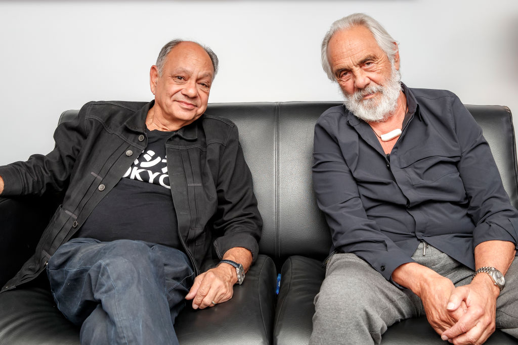 Kerri Doherty of "The IMDb Show" lounges with Cheech and Chong at the Grammy Museum in Los Angeles to help them celebrate the 40th anniversary of the comedy duos' stoner classic "Up in Smoke"on April 17 2018 in Los Angeles, California