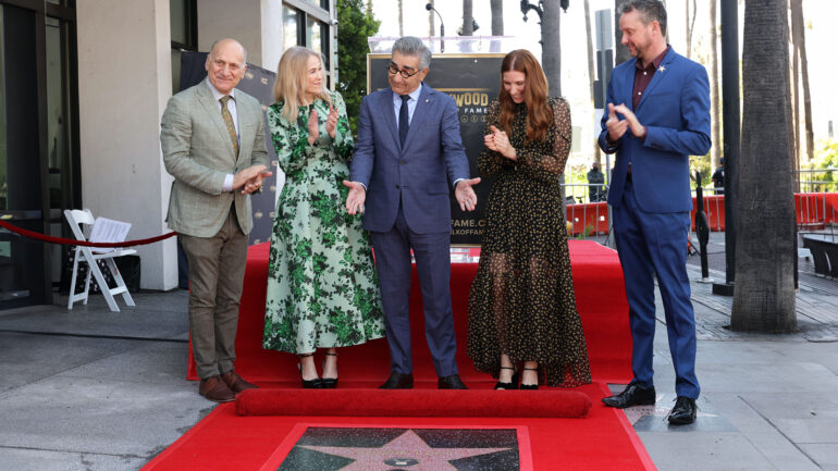 HOLLYWOOD, CALIFORNIA - MARCH 08: (L-R) Steve Nissen, President and CEO, Hollywood Chamber of Commerce, Catherine O'Hara, Eugene Levy, Sarah Levy and guest attend Eugene Levy's Hollywood Walk of Fame Star ceremony, celebrating the accomplished actor and host of Apple TV+’s “The Reluctant Traveler With Eugene Levy