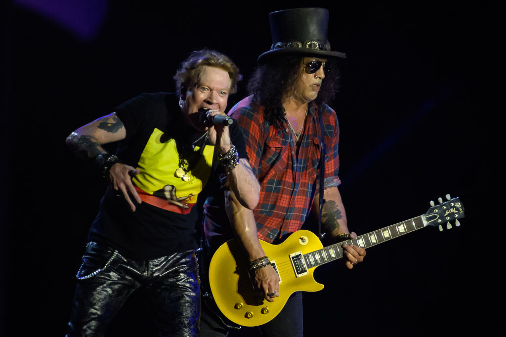Axl Rose (L) and Slash of Guns 'n' Roses perform on the Pyramid Stage on Day 4 of Glastonbury Festival 2023 on June 24, 2023 in Glastonbury, England. The Glastonbury Festival of Performing Arts sees musicians, performers and artists come together for three days of live entertainment