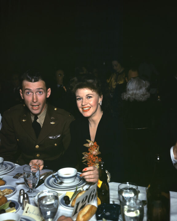 American actor James Stewart (1908 - 1997) in a United States Army Air Corps uniform, with actress Ginger Rogers (1911 - 1995) at the Academy Awards dinner in Los Angeles, 26th February 1942. 