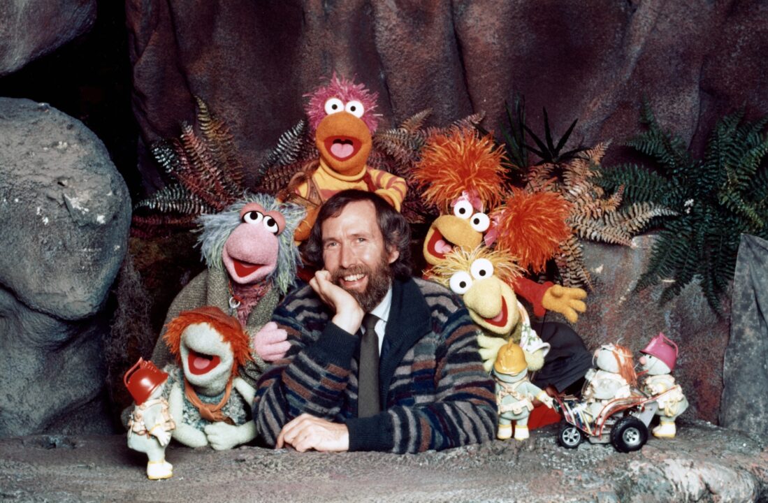 Fraggle Rock creator and executive producer Jim Henson (center), with, from left: a Doozer, Boober Fraggle, Mokey Fraggle, Gobo Fraggle, Red Fraggle, Wembley Fraggle, Doozers, (1984), 1983-1987