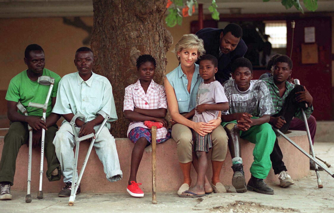 LUANDA, ANGOLA - JANUARY 14: Diana, Princess Of Wales, With Children Injured By Mines At Neves Bendinha Orthopaedic Workshop In Luanda, Angola. 