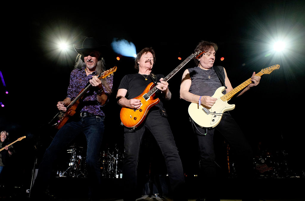 Musicians Patrick Simmons, Tom Johnston and John McFee of The Doobie Brothers perform onstage during 2016 Stagecoach California's Country Music Festival at Empire Polo Club on May 01, 2016 in Indio, California