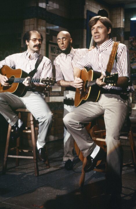 SATURDAY NIGHT LIVE -- Episode 4 -- Pictured: (l-r) Harry Shearer as Mark Shubb, Christopher Guest as Alan Barrows, Michael McKean as Jerry Palter during the 'Old Joe's Place' skit on November 3, 1984 -- 