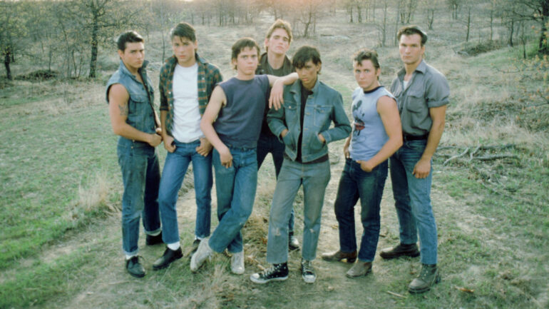 THE OUTSIDERS, from left: Tom Cruise, Rob Lowe, C. Thomas Howell, Matt Dillon (rear), Ralph Macchio, Emilio Estevez, Patrick Swayze, 1983,