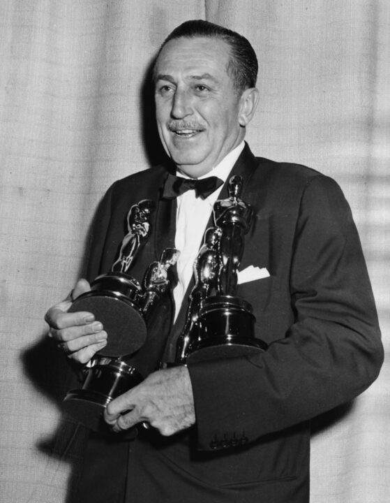 Film maker Walt Disney holding his four Oscars, for four different films, at the 26th Academy Awards, March 25th 1954. 