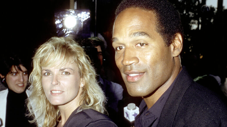 O.J. Simpson and Nicole Brown Simpson during Premiere of 