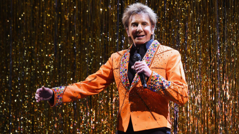 Barry Manilow performs on the runway during the Michael Kors Collection Fall 2019 Runway Show at Cipriani Wall Street on February 13, 2019 in New York City