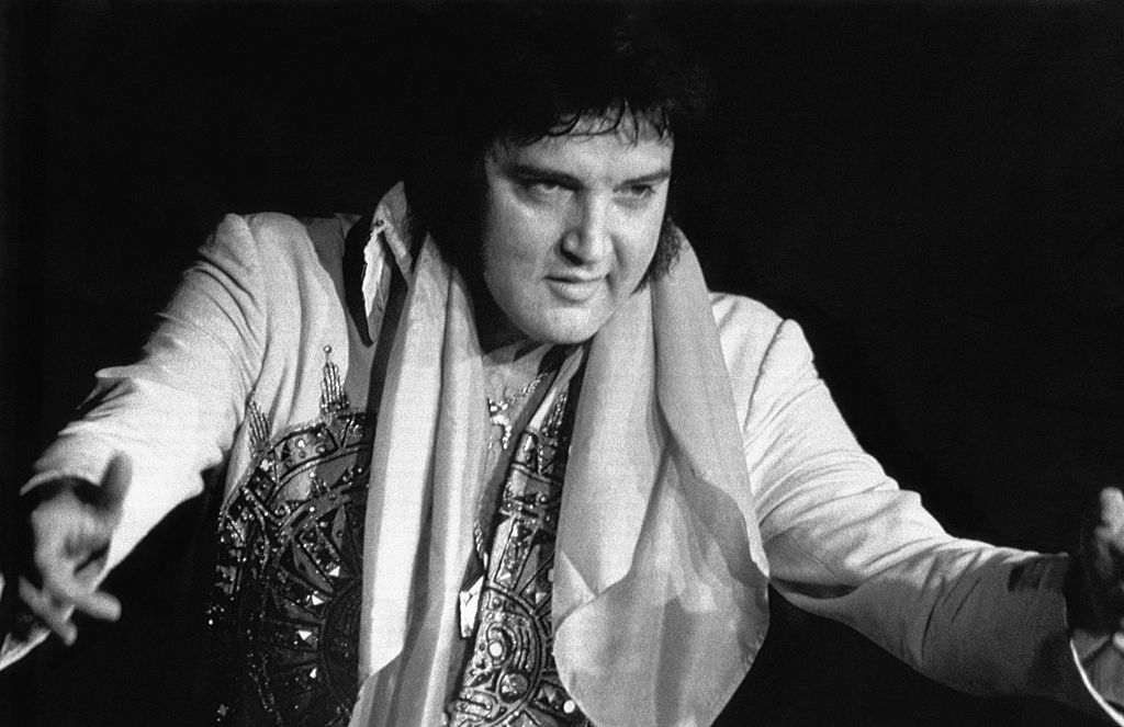 (Original Caption) 8/16/1977-Lincoln, NB: Elvis Presley, 42, died 8/16 in Memphis, TN, of repiratory failure at Baptist Hospital. Presley, the gyrating, hip-swinging King of Rock and Roll is shown during 6/20 concert here.