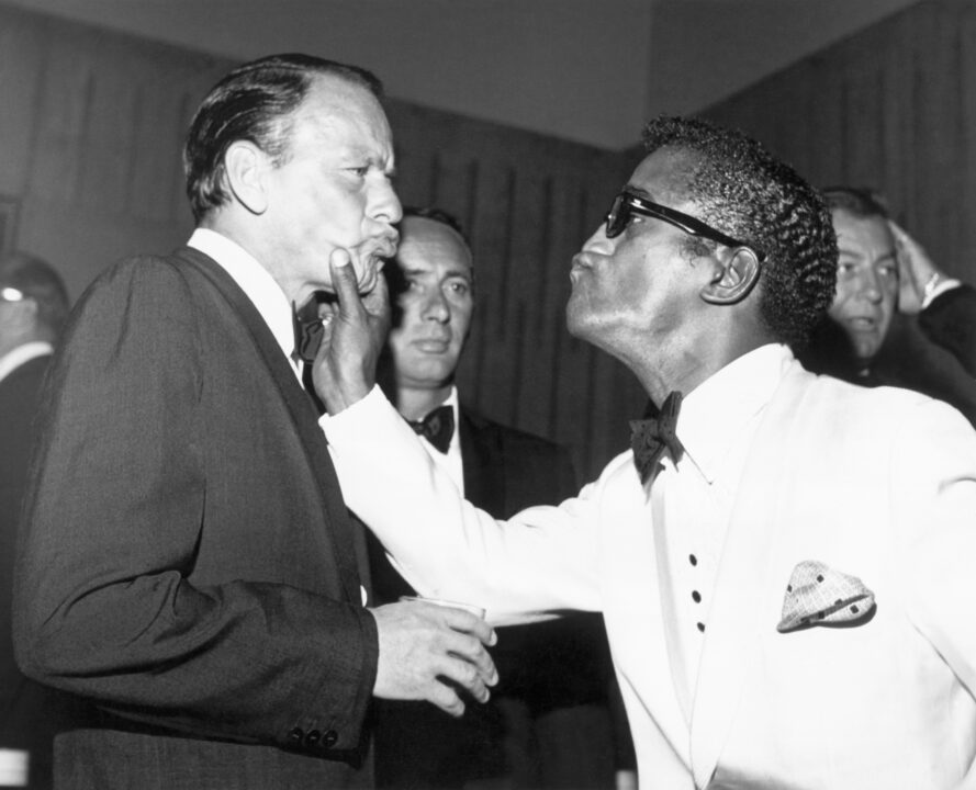 Sammy Davis, Jr. and Frank Sinatra at the Cedars of Lebanon charity dinner, 8th July 1961.