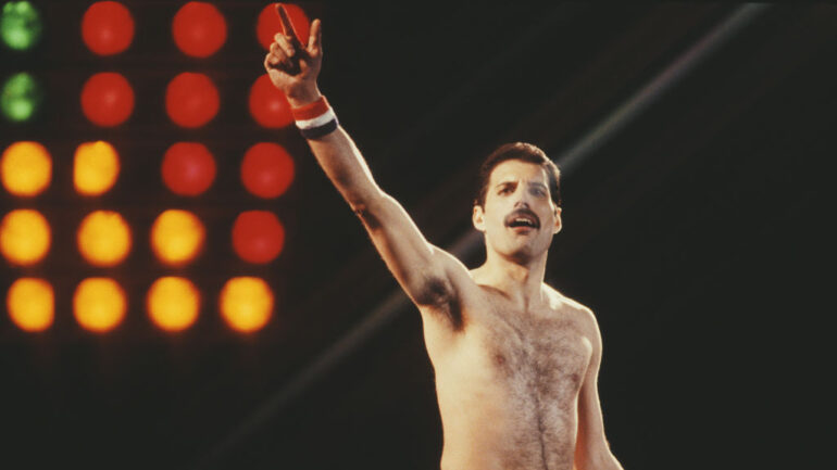 British singer Freddie Mercury (1946 - 1991) of rock band Queen in concert at Leeds Football Club, UK, 29th May 1982