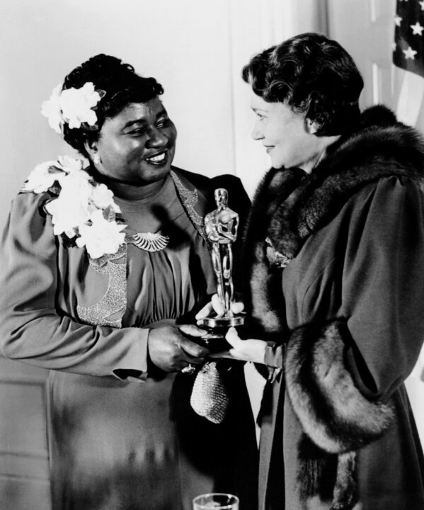 Hattie McDaniel, left, accepting her Best Supporting Actress Oscar (for GONE WITH THE WIND) from Fay Bainter, February 29, 1940