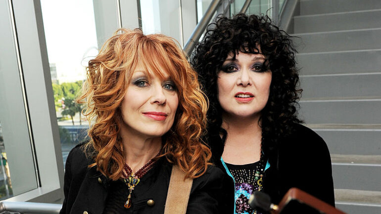 Musicians Nancy Wilson (L) and Ann Wilson of the rock band Heart pose at MusiCares' 