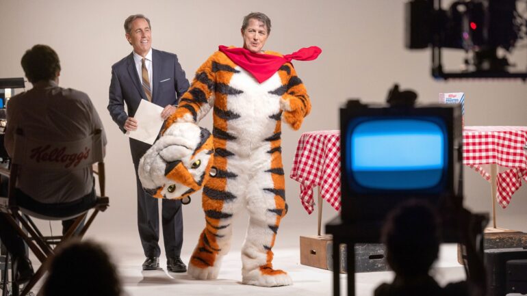 Unfrosted: The Pop-Tart Story director Jerry Seinfeld, Hugh Grant, as Tony the Tiger, on set, 2024