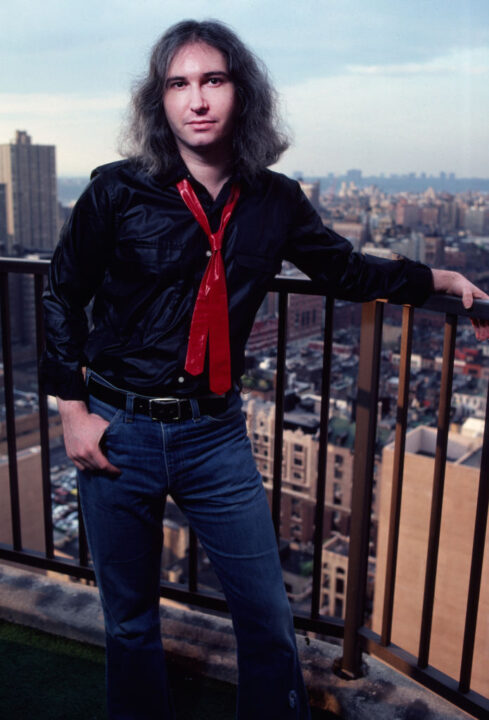 View of American Rock composer, musician, and producer Jim Steinman (1947 - 2021) as he stands on a terrace, New York, New York, April 30, 1981