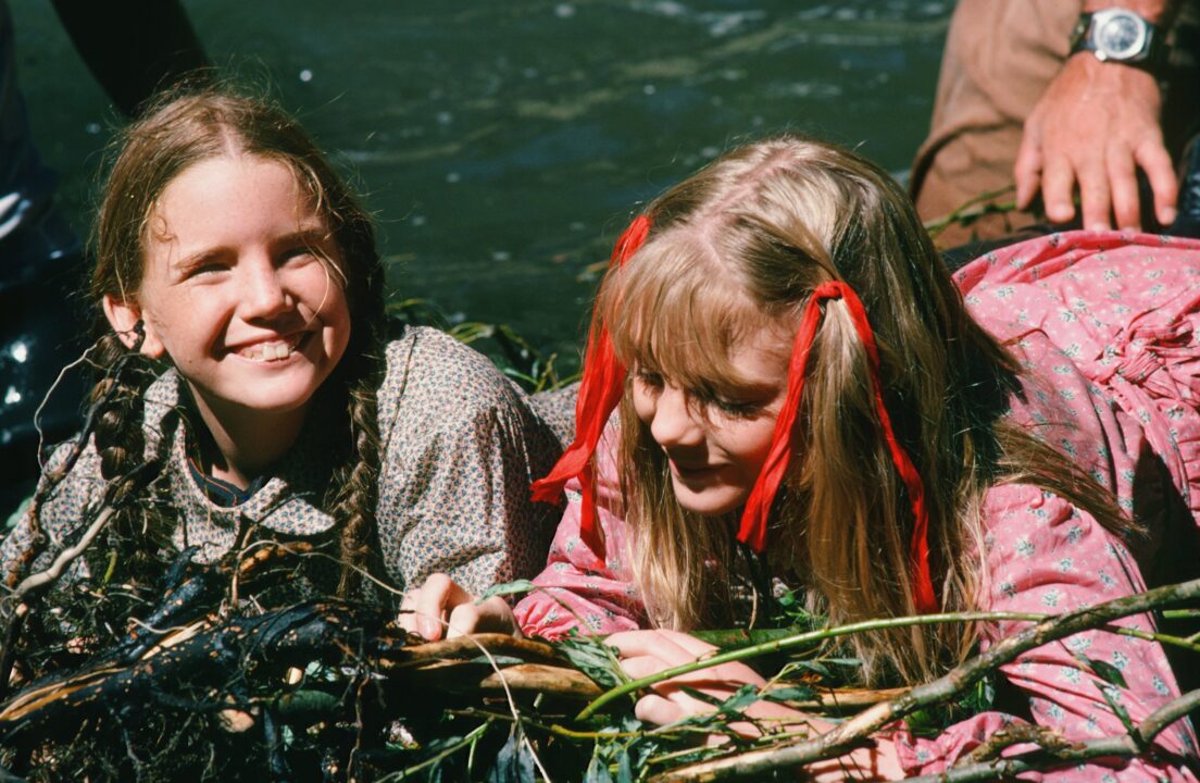 LITTLE HOUSE ON THE PRAIRIE -- "The Campout" Episode 9 -- Aired 11/19/1975 -- Pictured: (l-r) Melissa Gilbert as Laura Elizabeth Ingalls Wilder, Alison Arngrim as Nellie Oleson -- 