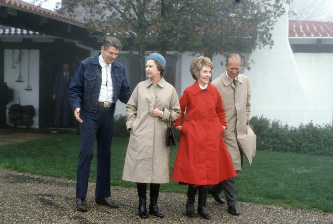 SANTA BARBARA, UNITED STATES - MARCH 02: Queen Elizabeth II And Prince Philip With President Ronald Reagan And First Lady Nancy Reagan At Their Mountain Top Getaway, Rancho Del Cielo, Just North Of Santa Barbara. Wearing Raincoats Because Of The Inclement Weather - There Was A Heavy Downpour Of Rain - The President Opted Instead For A Denim Jacket, Jeans And A Cowboy Style Lariat Tie For A Photocall Outside His Ranch House. 