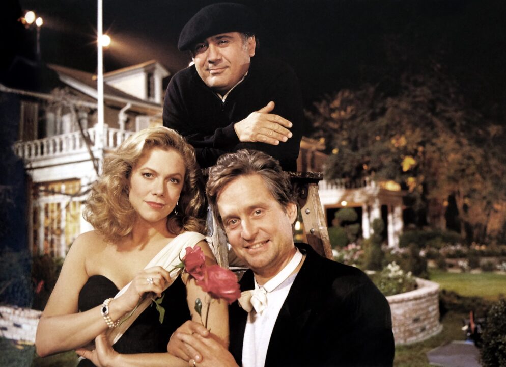 THE WAR OF THE ROSES, from left, Kathleen Turner, director and costar Danny DeVito, Michael Douglas, 1989. 