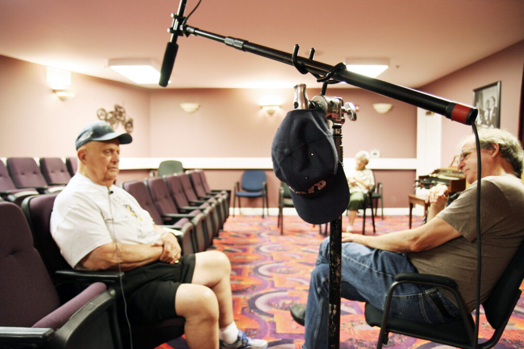 THE COLD BLUE, from left: Paul Haedike, director Erik Nelson, on-set, 2018.