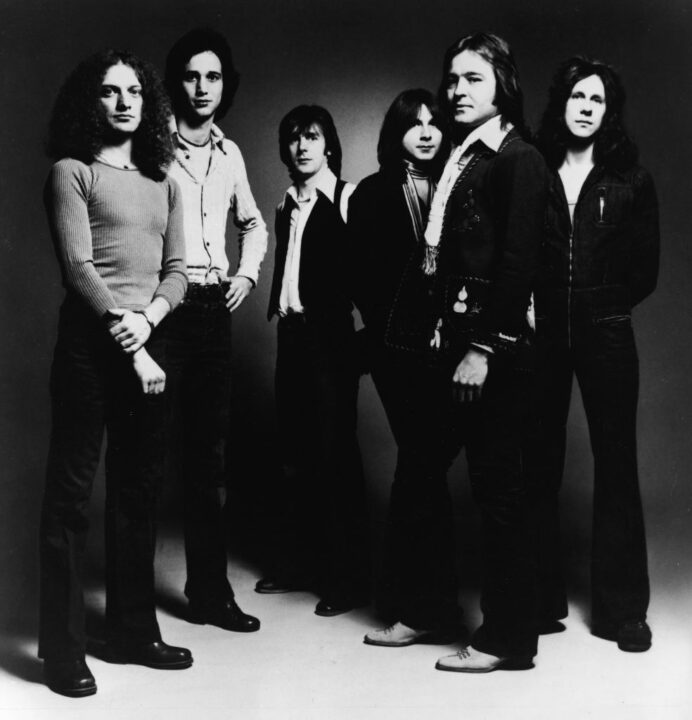 Promotional studio portrait of American rock group Foreigner, 1977. (L-R): Lou Gramm, Ian McDonald, Al Greenwood, Mick Jones, Dennis Ellio