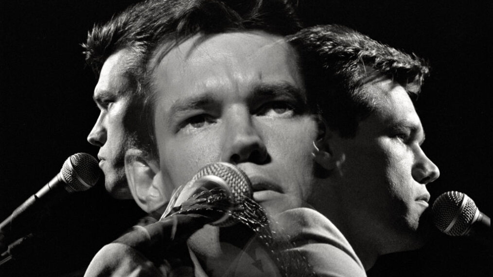 Randy Bruce Traywick, better known as Randy Travis, performs at the Cheyenne Frontier Days rodeo grounds on July, 1987 in Cheyenne, Wyoming. A country and gospel musician, singer, songwriter and an actor, Travis won six Grammy awards prior to a massive stroke in 2013. The image is an in-camera triple exposure