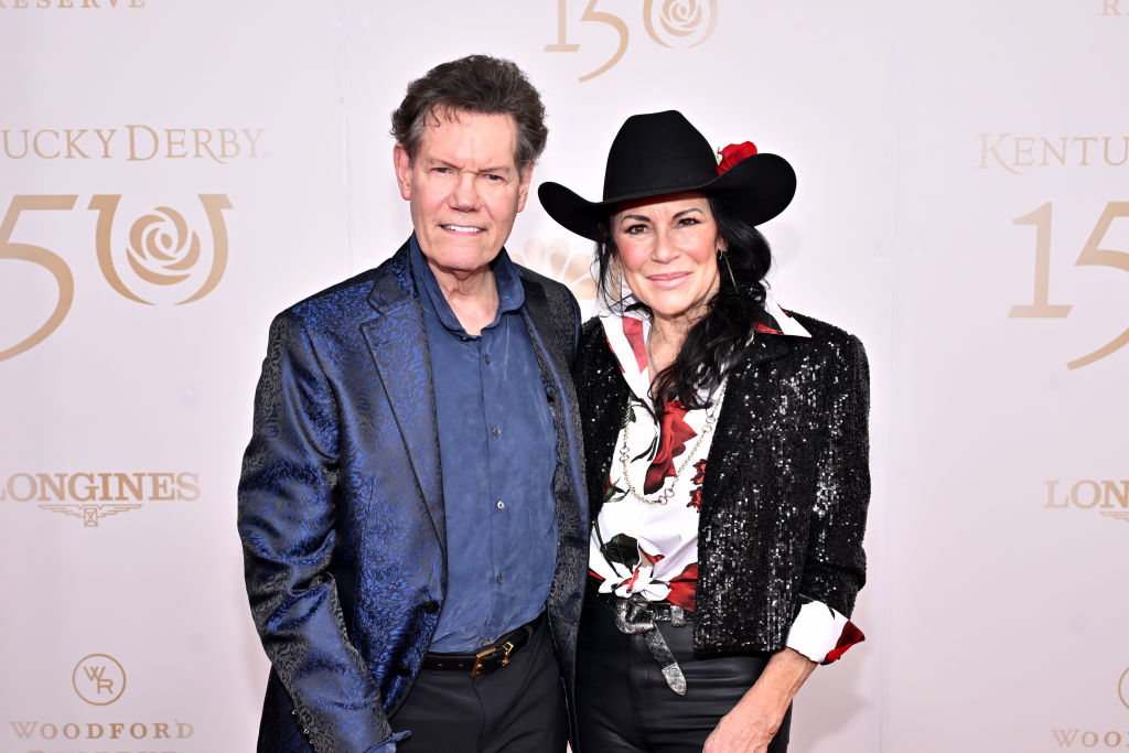 Randy Travis and Mary Davis attend the Kentucky Derby 150 at Churchill Downs on May 04, 2024 in Louisville, Kentucky