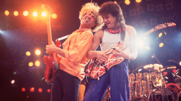 Rock musicians Sammy Hagar and Eddie Van Halen (1955 - 2020), both of the group Van Halen, performs onstage at the Rosemont Horizon, Rosemont, Illinois, March 15, 1986