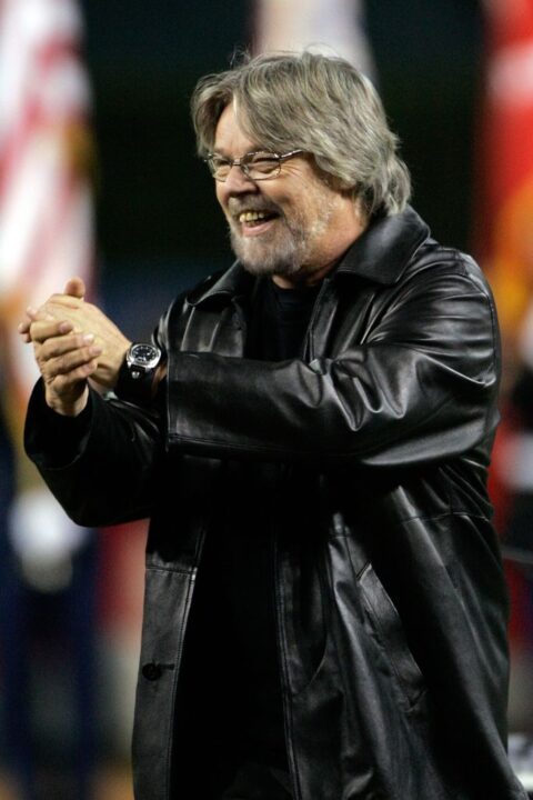 Recording artist Bob Seger acknoewledges the crowd after singing the National Anthem before the Detroit Tigers take on the St. Louis Cardinals during Game One of 2006 World Series October 21, 2006 at Comerica Park in Detroit, Michigan