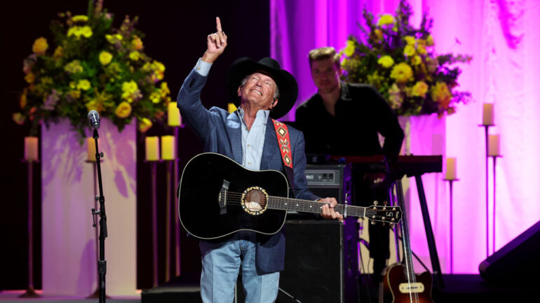 George Strait performs onstage for CMT Coal Miner's Daughter: A Celebration of the Life & Music of Loretta Lynn at Grand Ole Opry on October 30, 2022 in Nashville, Tennessee