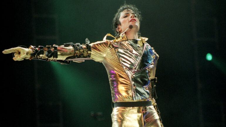 Michael Jackson performs on stage during is