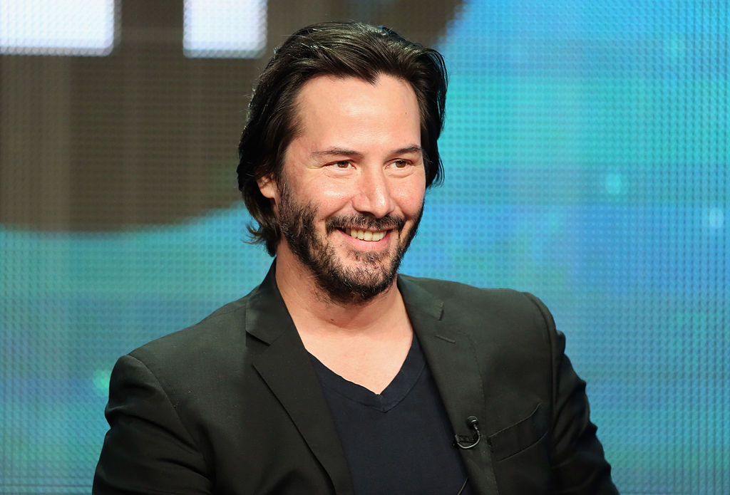 Host/producer Keanu Reeves speaks onstage during the "Side by Side" panel at the PBS portion of the 2013 Summer Television Critics Association tour at the Beverly Hilton Hotel on August 6, 2013 in Beverly Hills, California