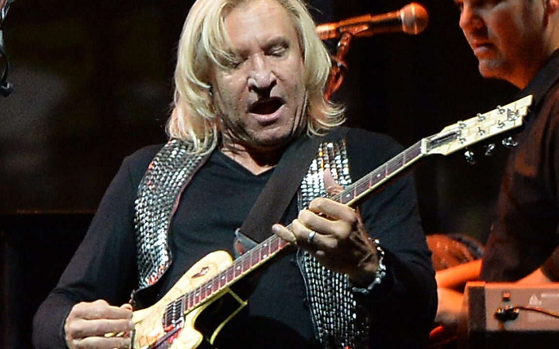 : Joe Walsh of the Eagles performs at the Bridgestone Arena on October 16, 2013 in Nashville, Tennessee. (Photo by Rick Diamond/Getty Images)