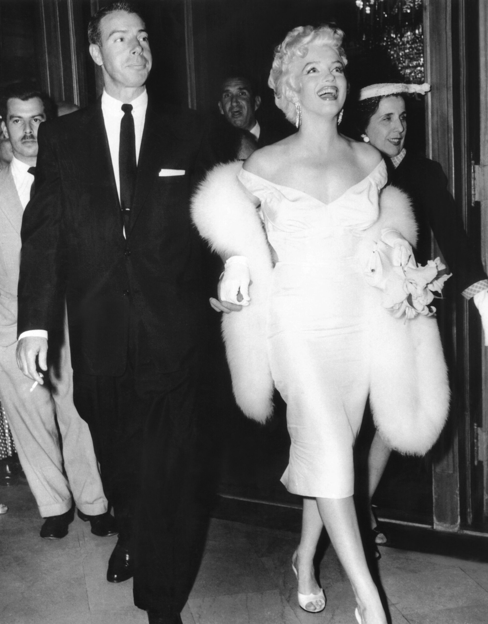 From left, Joe DiMaggio, Marilyn Monroe, at the premiere of THE SEVEN YEAR ITCH, June 1, 1955