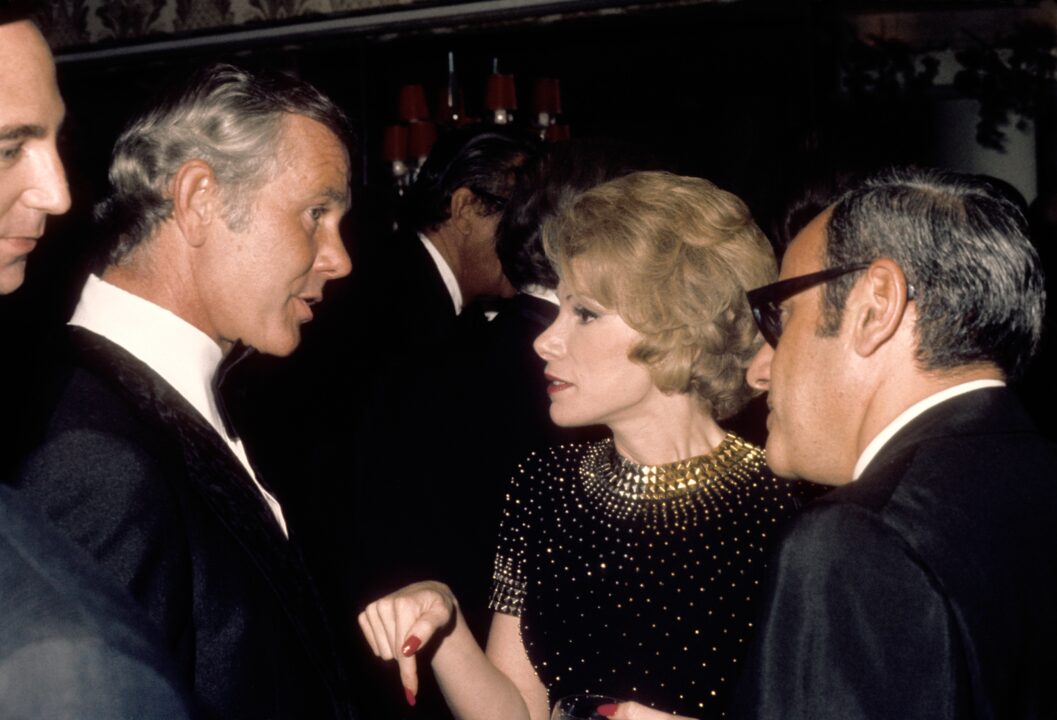 LOS ANGELES - SEPTEMBER 30: Tonight Show host Johnny Carson greets comedienne Joan Rivers and her Husband Edgar Rosenberg at the party after taping the 10th anniversary show on September 30 1972 in Los Angeles, California.