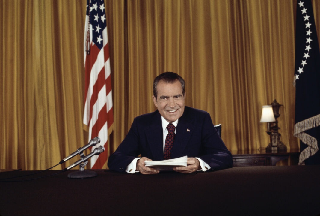 (Original Caption) President Nixon, in a nationally televised address 8/15, asks for support against "those who would exploit Watergate in order to keep us from doing what we were elected to do." He also proclaimed his innocence of any complicity in the affair. Nixon posed for still photographers after the address, as no pictures were permitted during the telecast.