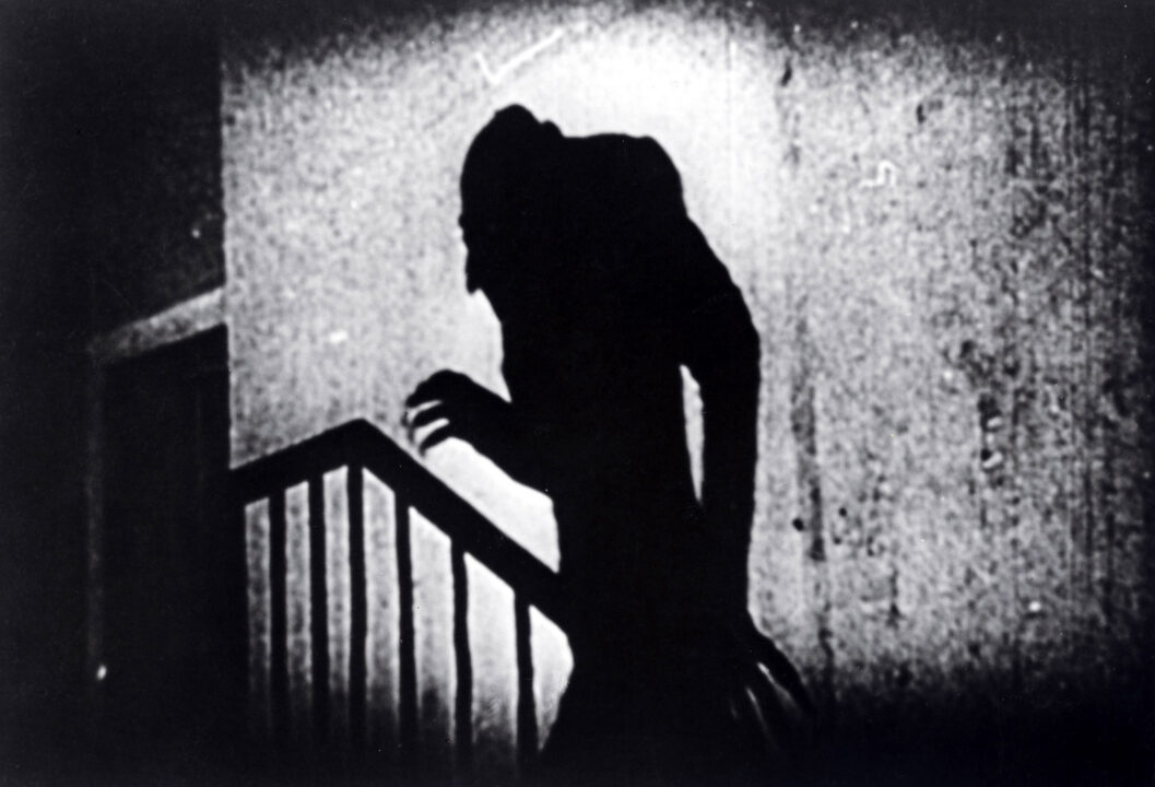 image from the 1922 silent movie "Nosferatu." It shows the shadow of actor Max Schreck as the ratlike vampire Count Orlok ascending a staircase.