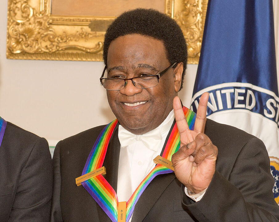 Singer Al Green, one of the five recipients of the 2014 Kennedy Center Honors, waits to pose for a group photo following a dinner hosted by United States Secretary of State John F. Kerry at the U.S. Department of State on December 6, 2014 in Washington, D.C.