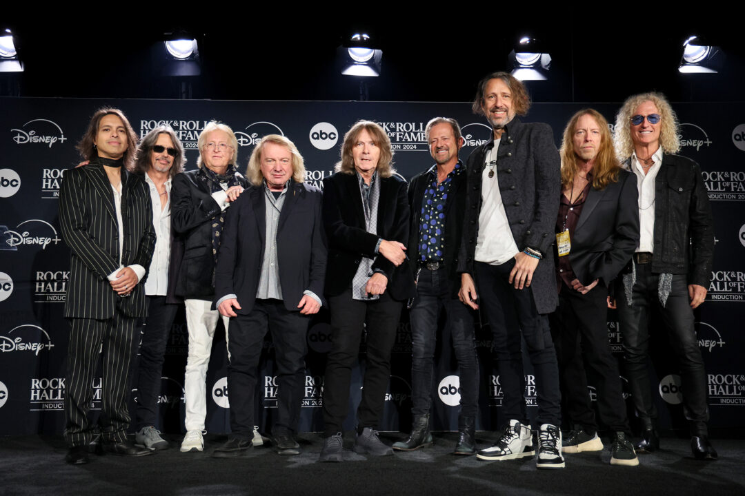 CLEVELAND, OHIO - OCTOBER 19: (L-R) Luis Maldonado, Kelly Hansen, Rick Wills, Lou Gramm, Al Greenwood, Chris Frazier, Michael Bluestein, Jeff Pilson and Bruce Watson of Foreigner pose in the press room during the 2024 Rock & Roll Hall Of Fame Induction Ceremony streaming on Disney+ at Rocket Mortgage Fieldhouse on October 19, 2024 in Cleveland, Ohio.