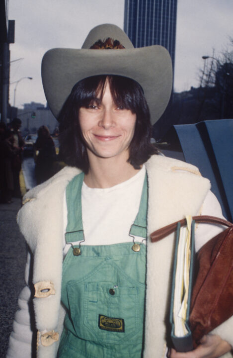 Kate Jackson in overalls shearling jacket and Stetson; circa 1970; New York. 