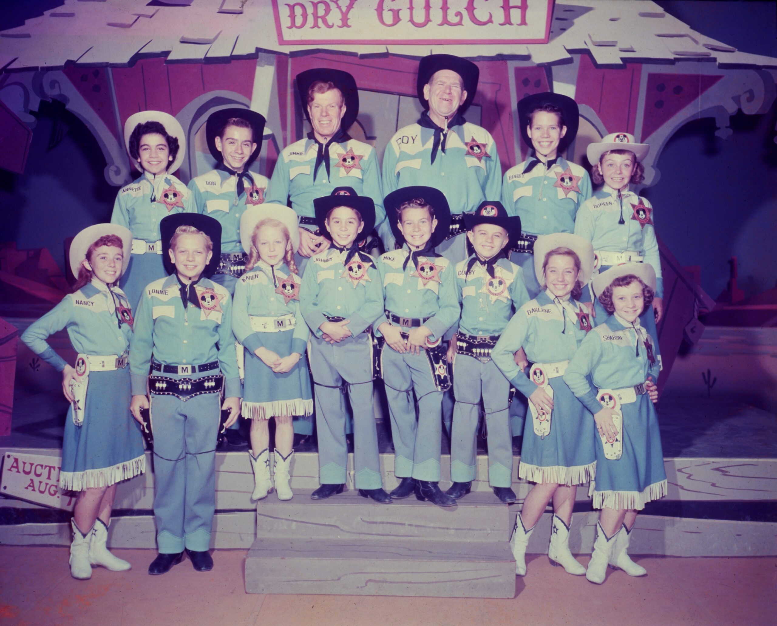 THE MICKEY MOUSE CLUB, front row from left: Nancy, Lonnie Burr, Karen Pendleton, Johnny, Mike, Carl Cubby O'Brien, Darlene Gillespie, Sharon Baird; Back row from left: Annette Funicello, Don Grady, Jimmie Dodd, Roy Williams, Bobby Burgess, Doreen Tracey, 1955-59.