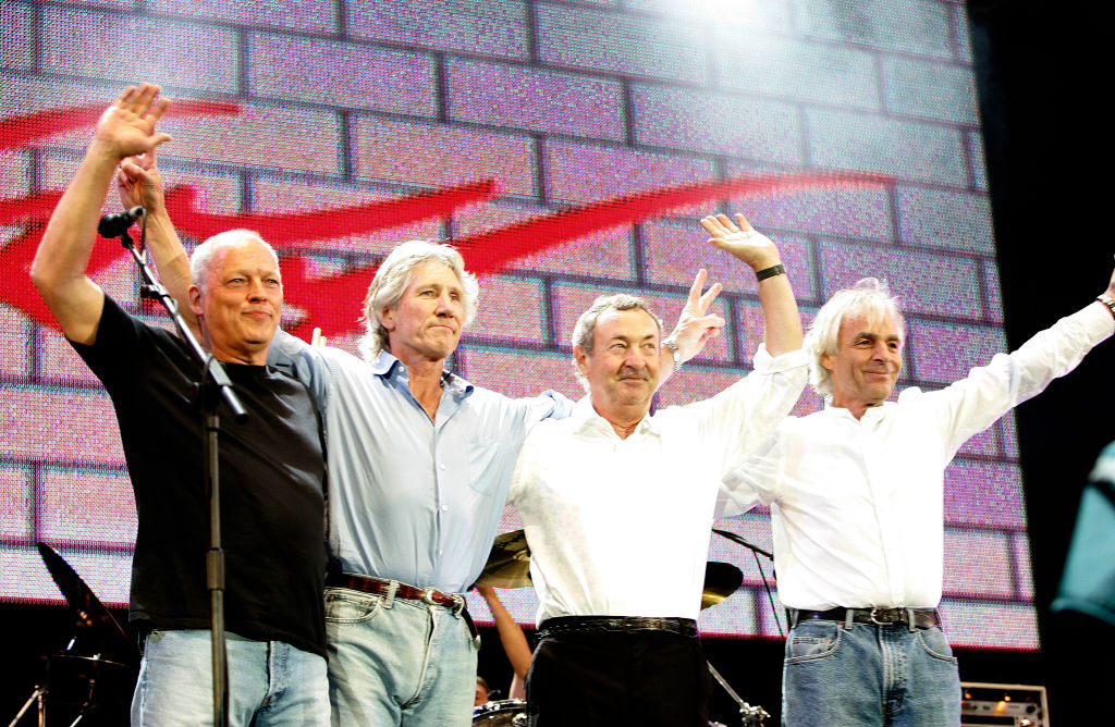 (L to R) David Gilmour, Roger Waters, Nick Mason and Rick Wright from the band Pink Floyd on stage at "Live 8 London" in Hyde Park on July 2, 2005 in London, England. The free concert is one of ten simultaneous international gigs including Philadelphia, Berlin, Rome, Paris, Barrie, Tokyo, Cornwall, Moscow and Johannesburg. The concerts precede the G8 summit (July 6-8) to raising awareness for MAKEpovertyHISTORY