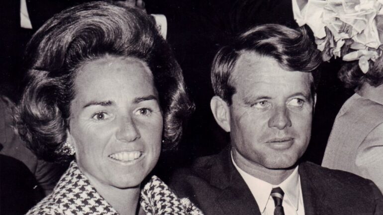 Ethel Kennedy and husband Sen. Robert F. Kennedy applaud one of the speakers at the New York State Democratic Committee Forum at Brooklyn College on May 31, 1966