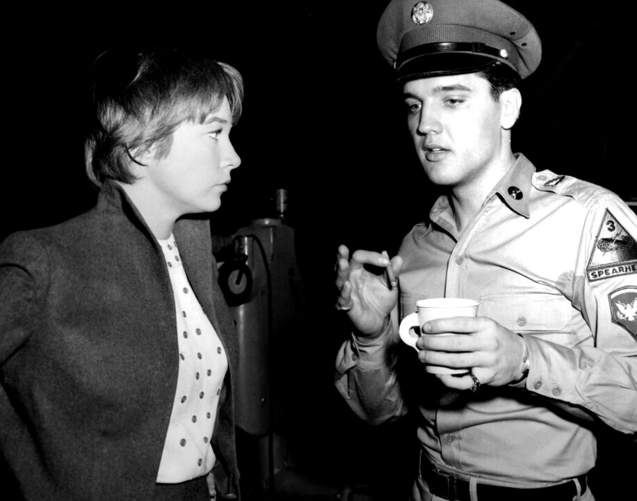 G.I. BLUES, from left: shirley MacLaine visits Elvis Presley on set, 1960