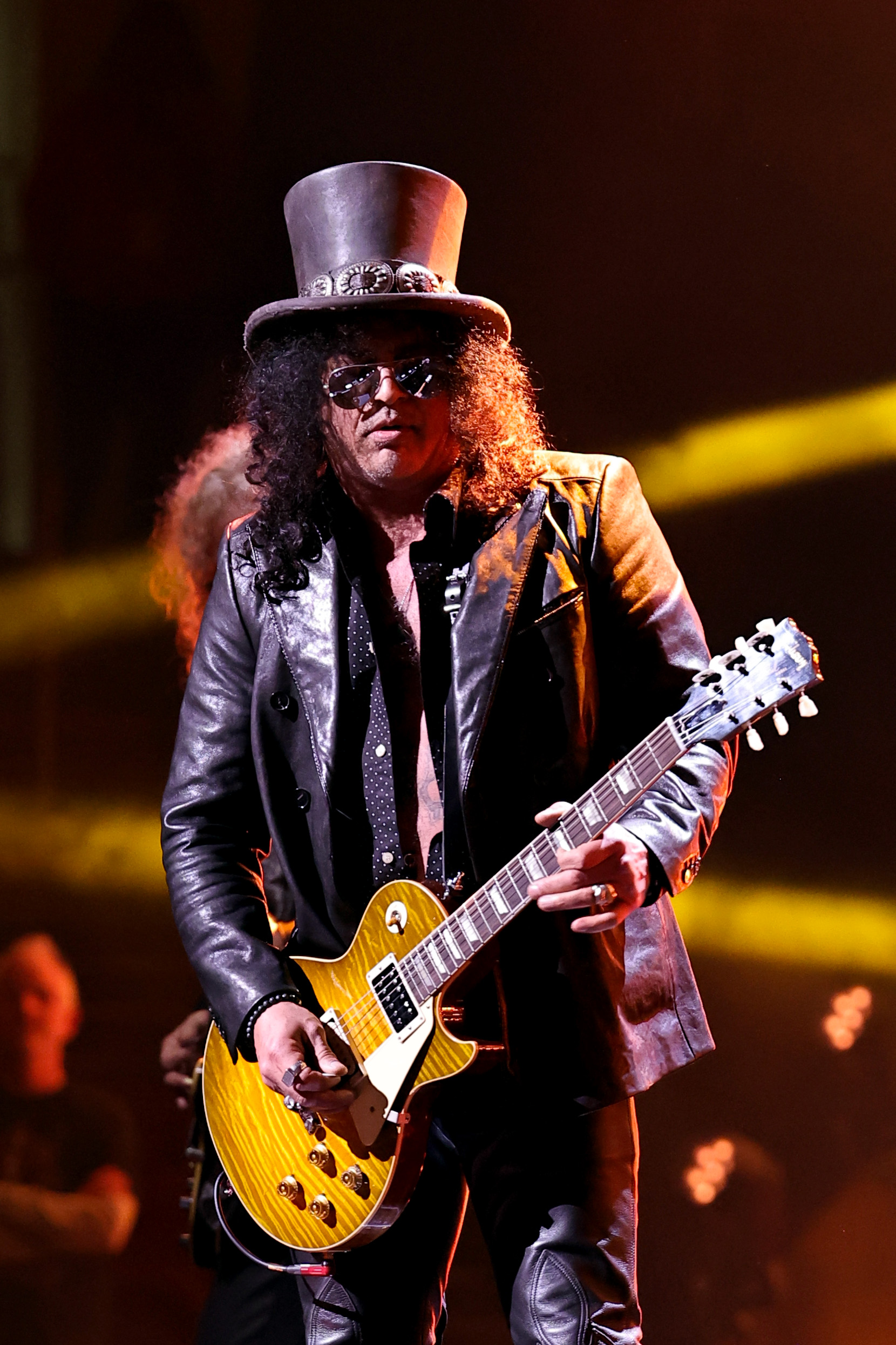 CLEVELAND, OHIO - OCTOBER 19: Slash performs onstage during the 2024 Rock & Roll Hall Of Fame Induction Ceremony streaming on Disney+ at Rocket Mortgage Fieldhouse on October 19, 2024 in Cleveland, Ohio.