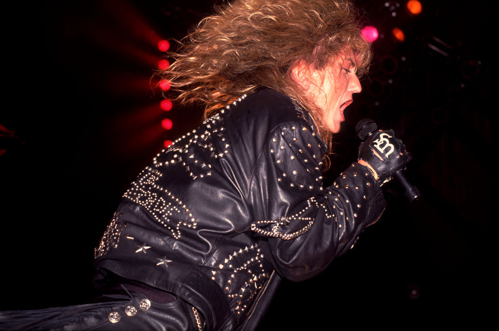 English Rock musician David Coverdale, of the group Whitesnake, performs onstage at the Alpine Valley Music Theater, East Troy, Wisconsin, May 28, 1990